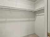 708B-Phlox-Dr-Savoy-IL-61874-large-026-022-WalkIn-Closet-1500x1000-72dpi